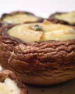 Запеченные фаршированные шампиньоны