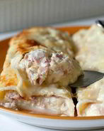 Каннеллони с ветчиной и сыром