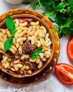 Макароны с тушенкой на сковороде