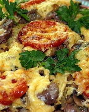 Мясо по-французски с помидорами