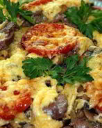 Мясо по-французски с помидорами