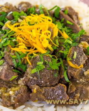Говядина, тушенная с лимоном и апельсином