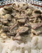 Куриные сердечки со сметаной