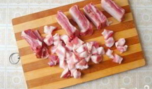 запеченные свиные ребрышки с овощами