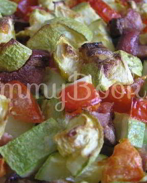 Кабачки, запеченные с сосисками и помидорами