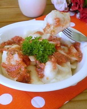 Пельмени под соусом