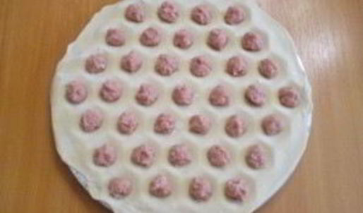 пельмени под соусом