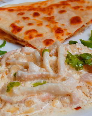 Кальмары, тушенные в сметане