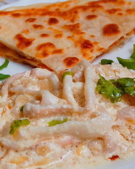 Рецепт кальмары, тушенные в сметане