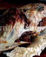 Карп фаршированный гречневой кашей с рубленым яйцом