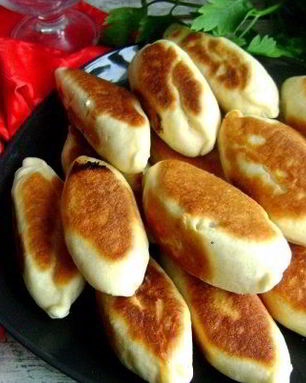 Пирожки с рисом из дрожжевого теста