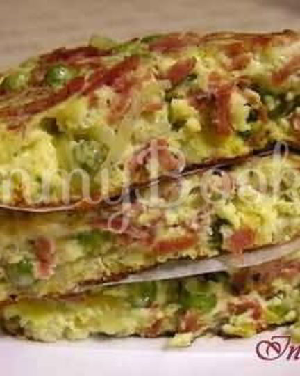 Рецепт фриттаты с зеленым горошком, ветчиной и луком