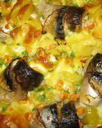 Рыбные рулетики с овощами